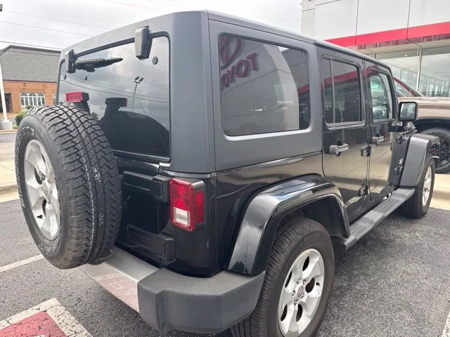 Used 2013 Black Jeep Unlimited Sahara image 7