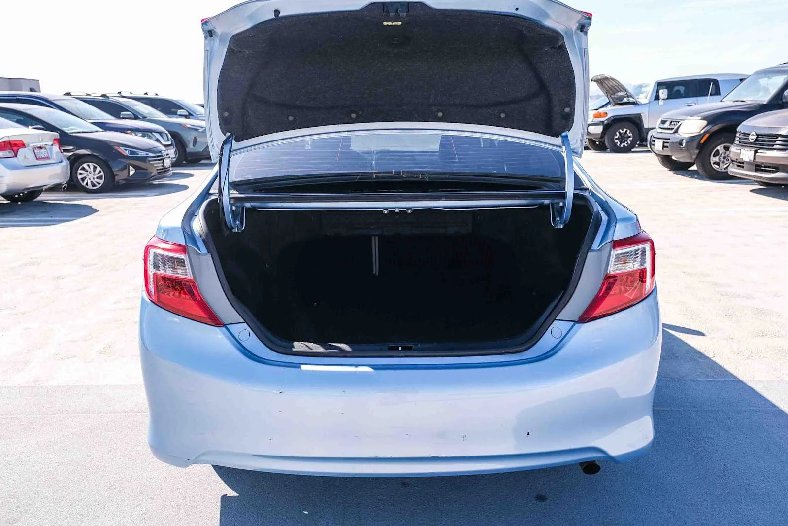 Used 2013 Clearwater Blue Metallic Toyota LE image 24