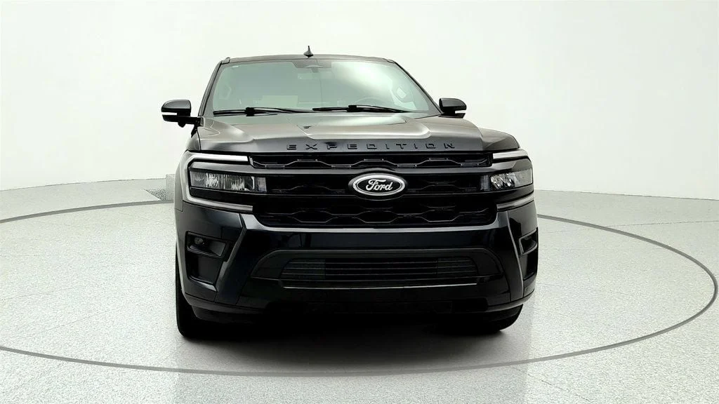 Used 2023 Agate Black Metallic Ford Limited 4x4 w/ Heavy-Duty Trailer Tow Pkg image 2