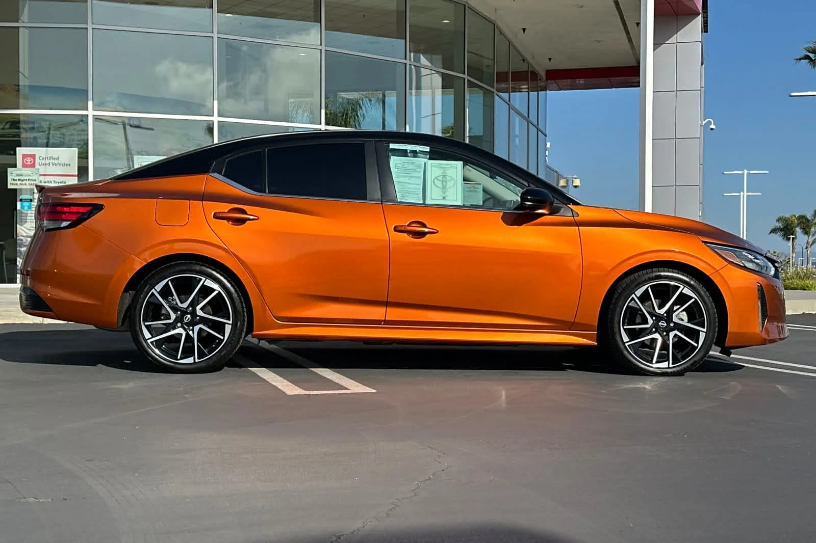 Used 2024 Monarch Orange Metallic/Super Black Nissan SR image 3