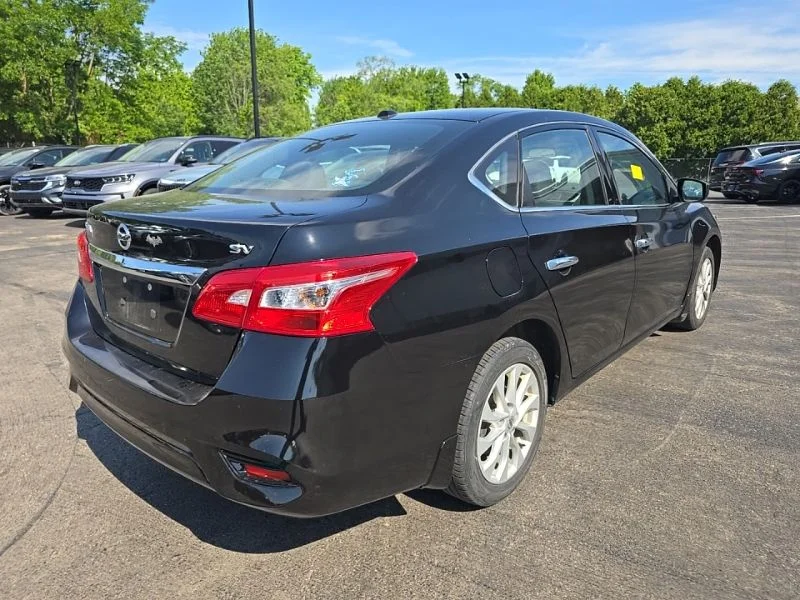Used 2018 Black Nissan SV image 8