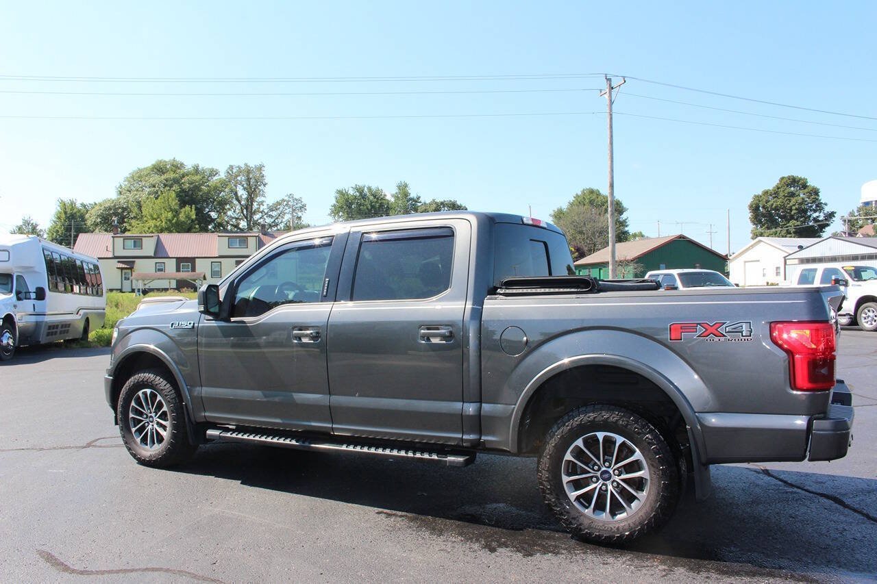 Used 2018 Magnetic Ford Lariat 4x4 4dr SuperCrew 5.5 ft. SB image 2