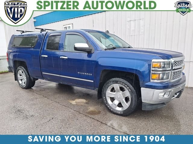 Used 2014 Blue Topaz Metallic Chevrolet LTZ image 1