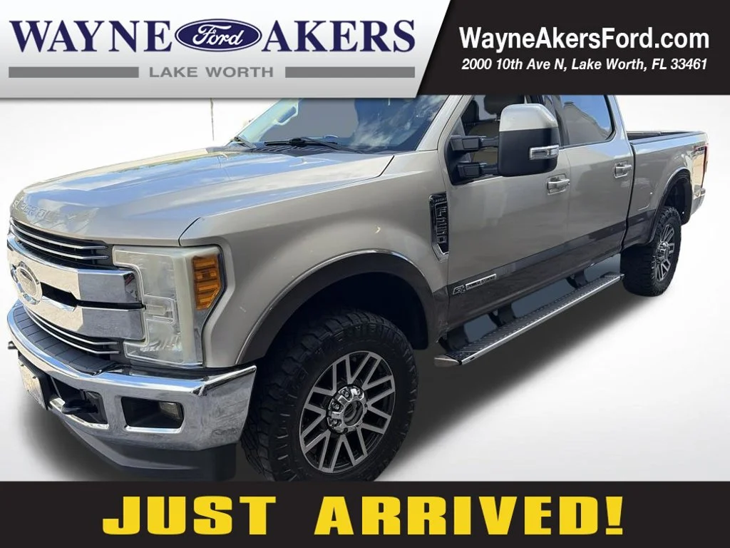 Used 2017 Gold Ford Lariat image 1