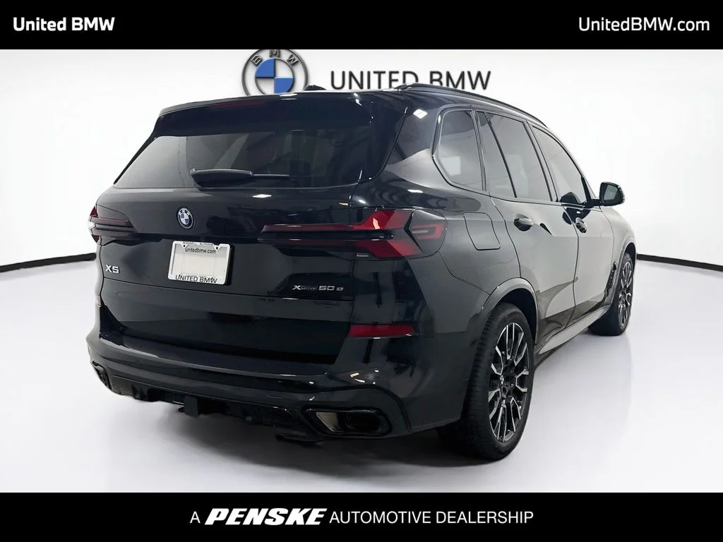 Certified Used 2025 Black Sapphire Metallic BMW xDrive50e image 5