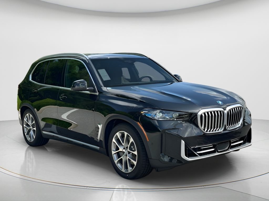 New 2026 Black Sapphire Metallic BMW xDrive50e image 3