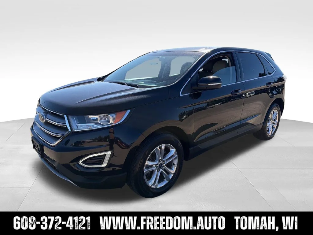 Used 2016 Black Ford SEL image 2