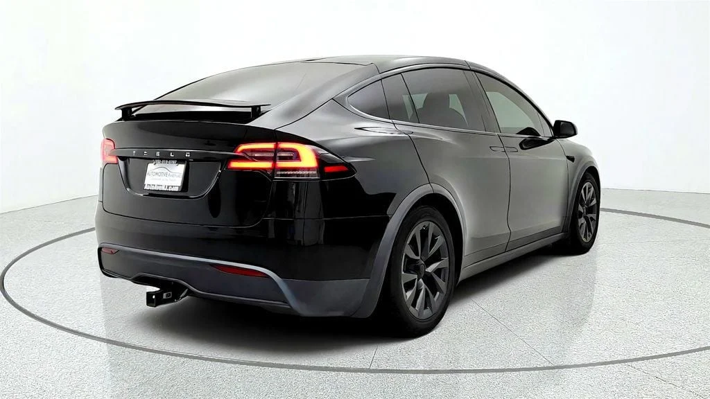 Used 2023 Solid Black Tesla AWD image 5