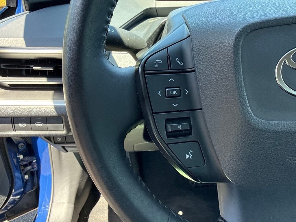 Used 2025 Reservoir Blue Toyota LE image 11