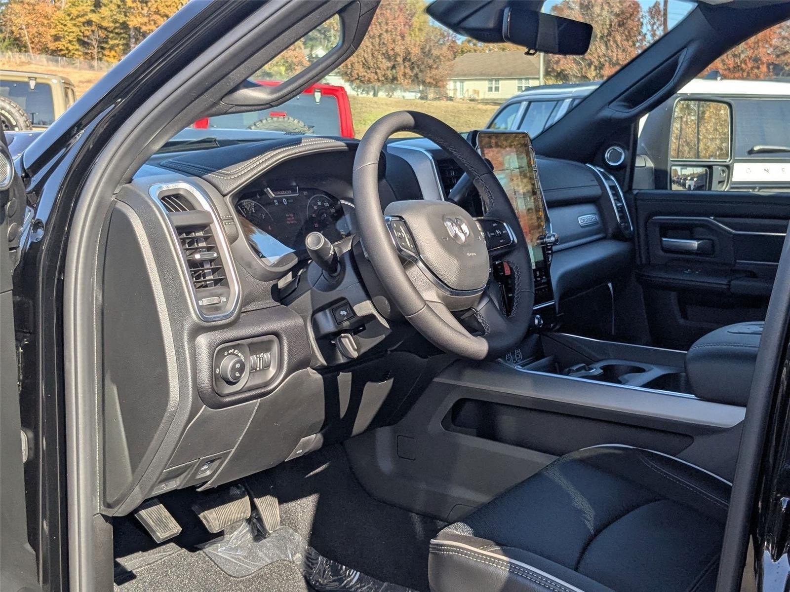 New 2026 Diamond Black Crystal Pearl-Coat Exterior Paint RAM Laramie image 2