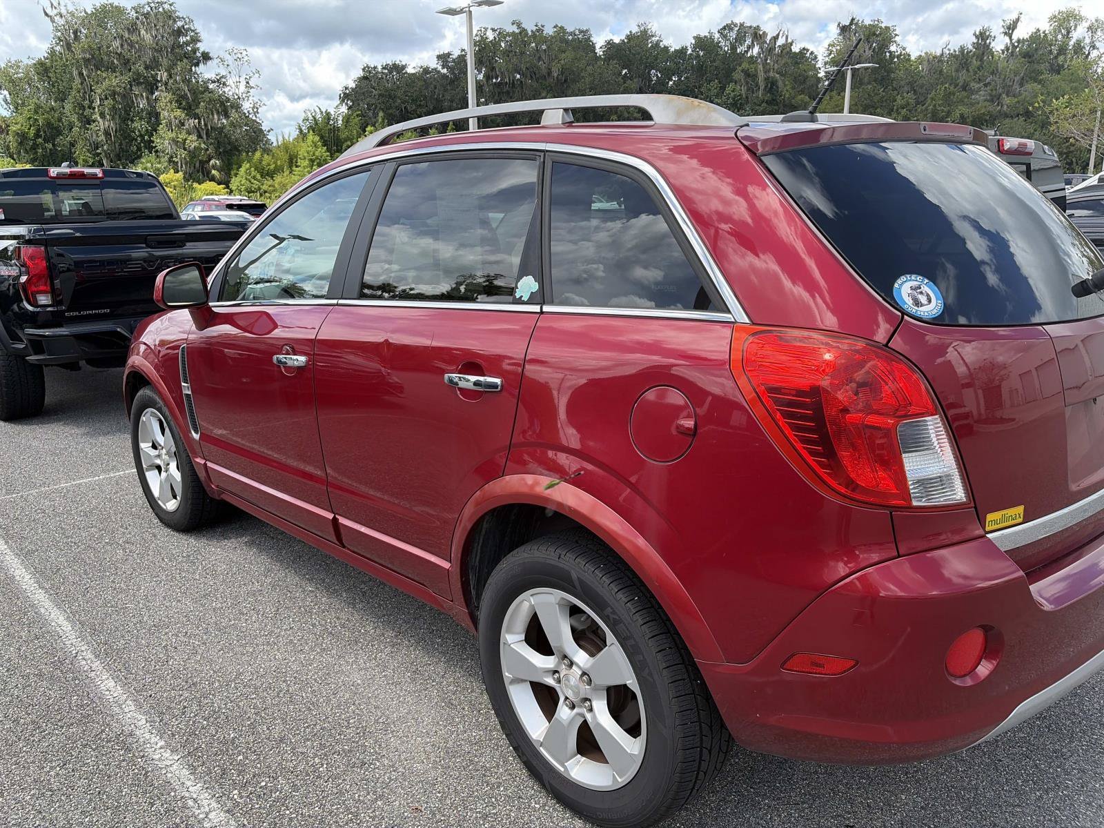 Used 2014 Crystal Red Tintcoat Chevrolet LTZ image 2