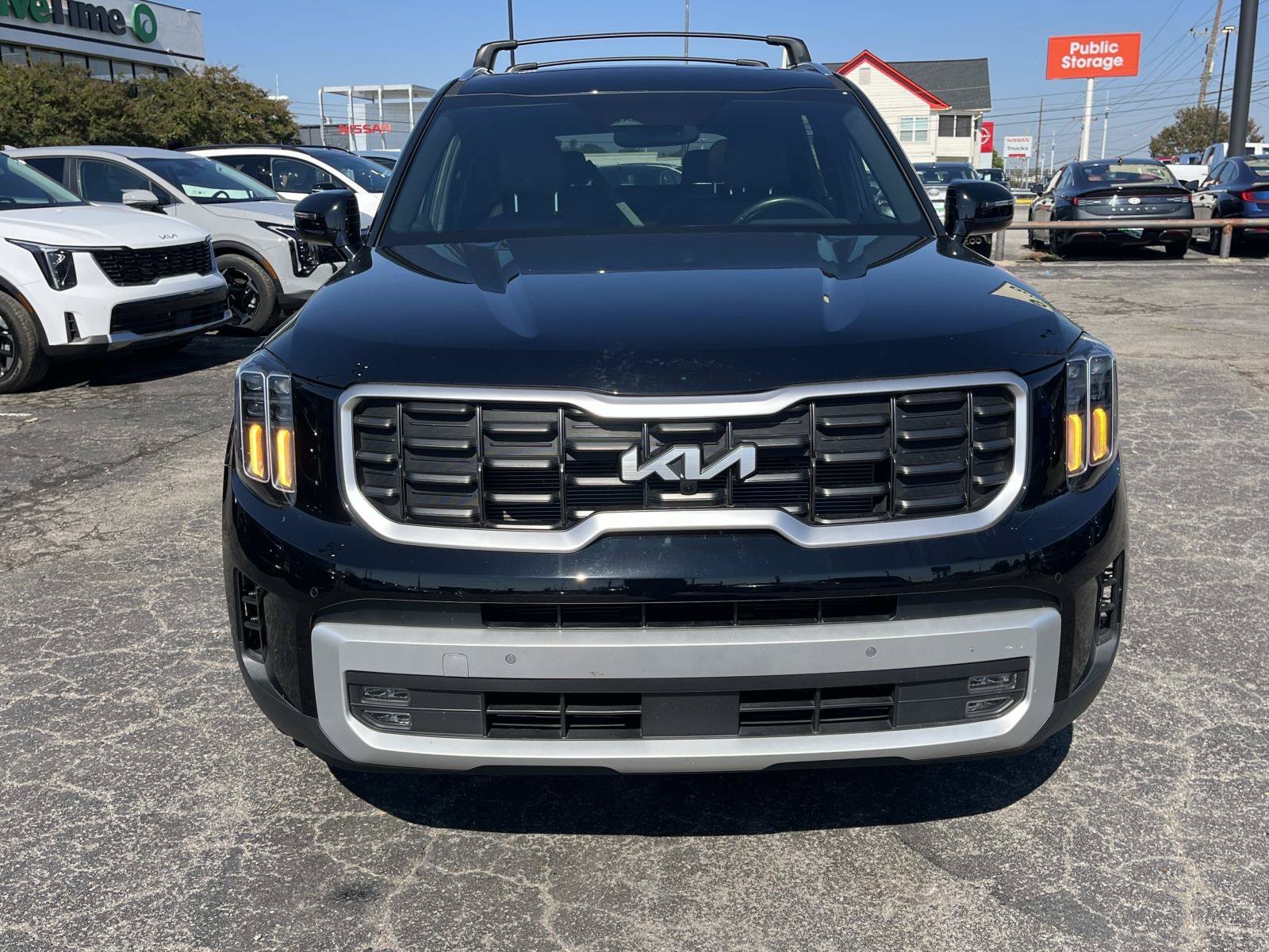 Used 2024 Ebony Black Kia SX image 2