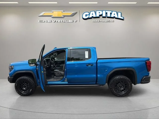 Used 2024 Dynamic Blue Metallic GMC AT4X image 9