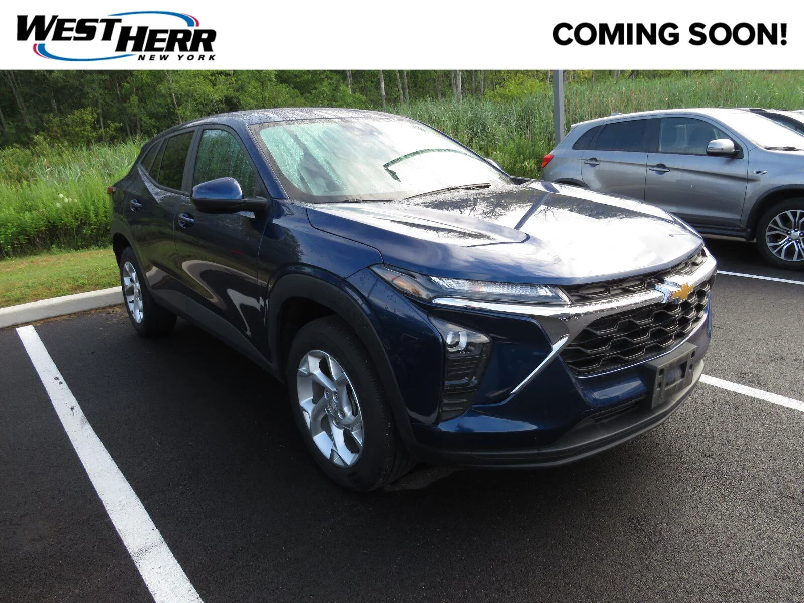 Used 2024 Blue Glow Metallic Chevrolet LS image 1