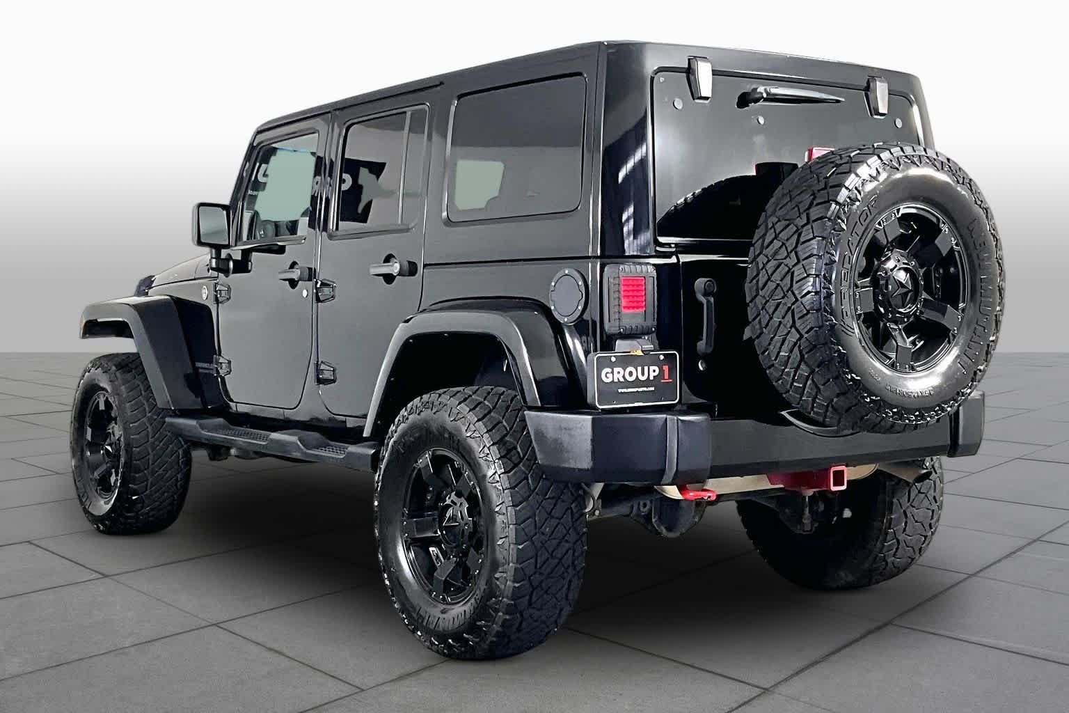 Used 2014 Black Clearcoat Jeep Altitude image 11