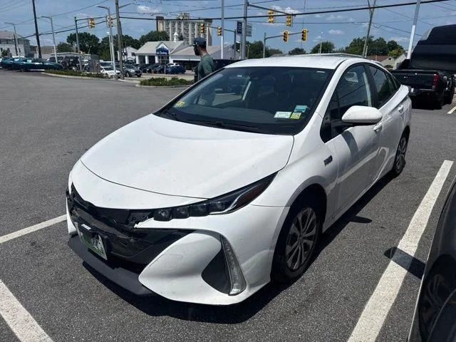 Used 2021 White Toyota LE image 1