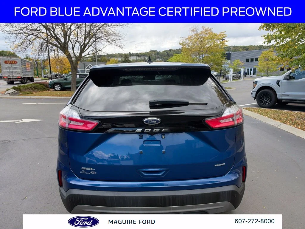 Used 2024 Blue Metallic Ford SEL image 6