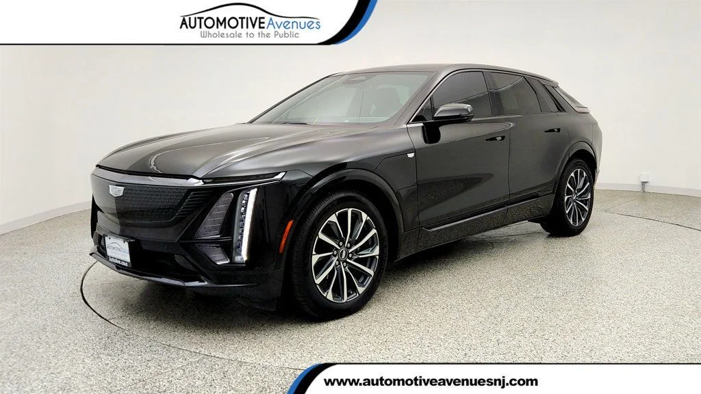 Used 2024 Stellar Black Metallic Cadillac 4dr Sport w/1SJ image 1
