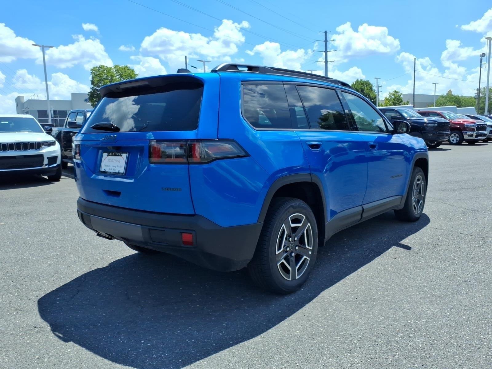 New 2026 Hydro Blue Pearl-Coat Exterior Paint Jeep Laredo image 2