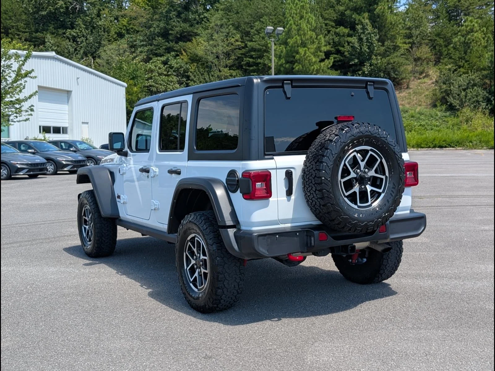 Used 2025 Bright White Clear Coat Jeep Rubicon image 4