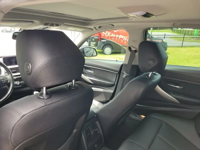 Used 2018 Black BMW 320i xDrive image 11