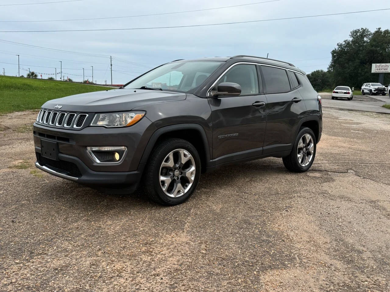Used 2019 Charcoal Jeep Limited 4x4 4dr SUV image 1
