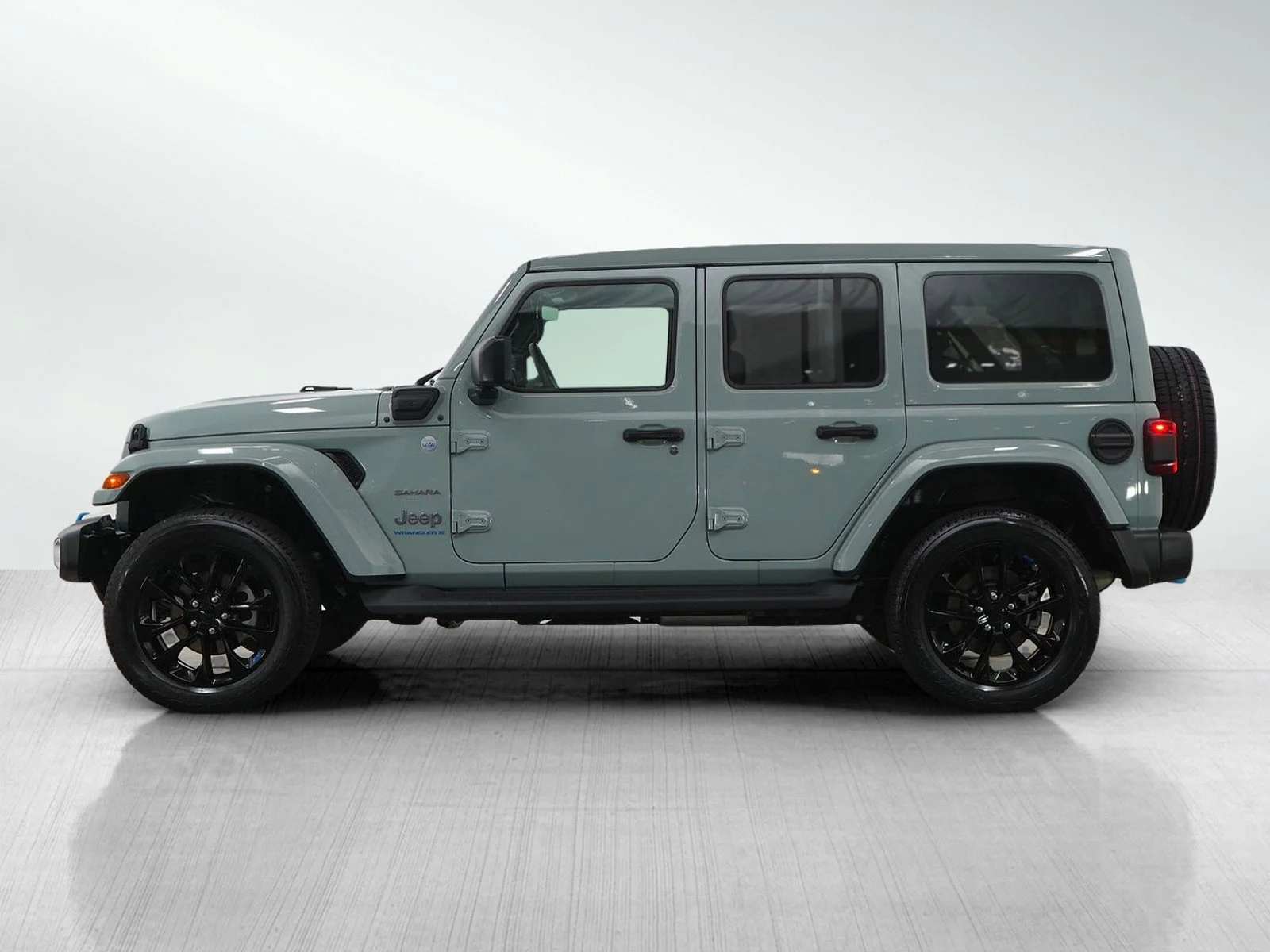 Used 2023 Jeep Wrangler 4xe Sahara 4XE with VIN 1C4JJXP64PW557148 for sale in Hopkins, Minnesota