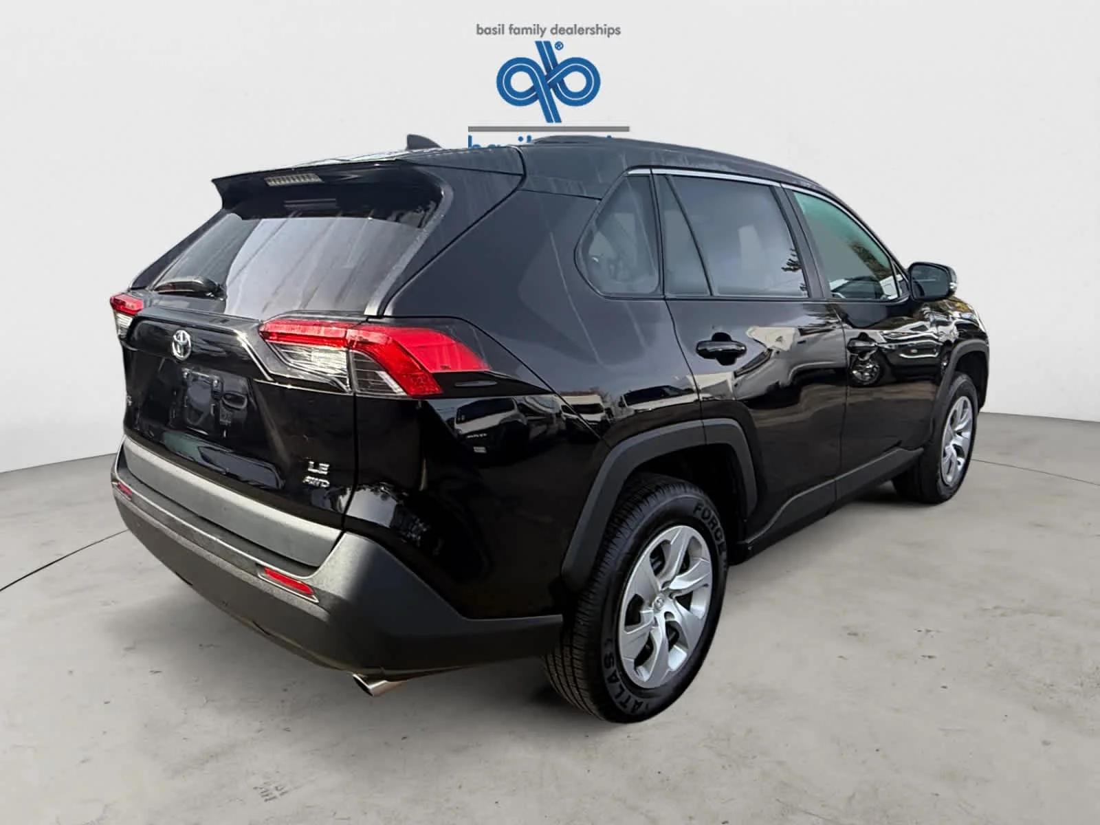 Used 2021 Midnight Black Metallic Toyota LE image 7