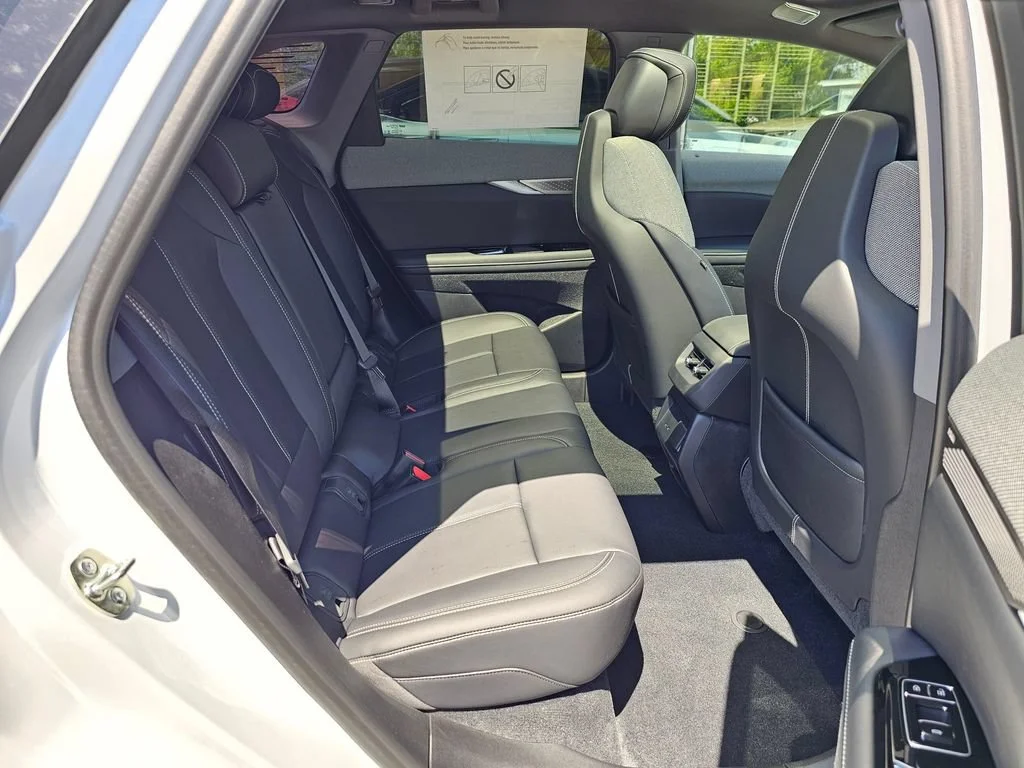 New 2026 Vibrant White Tricoat Cadillac Sport image 12