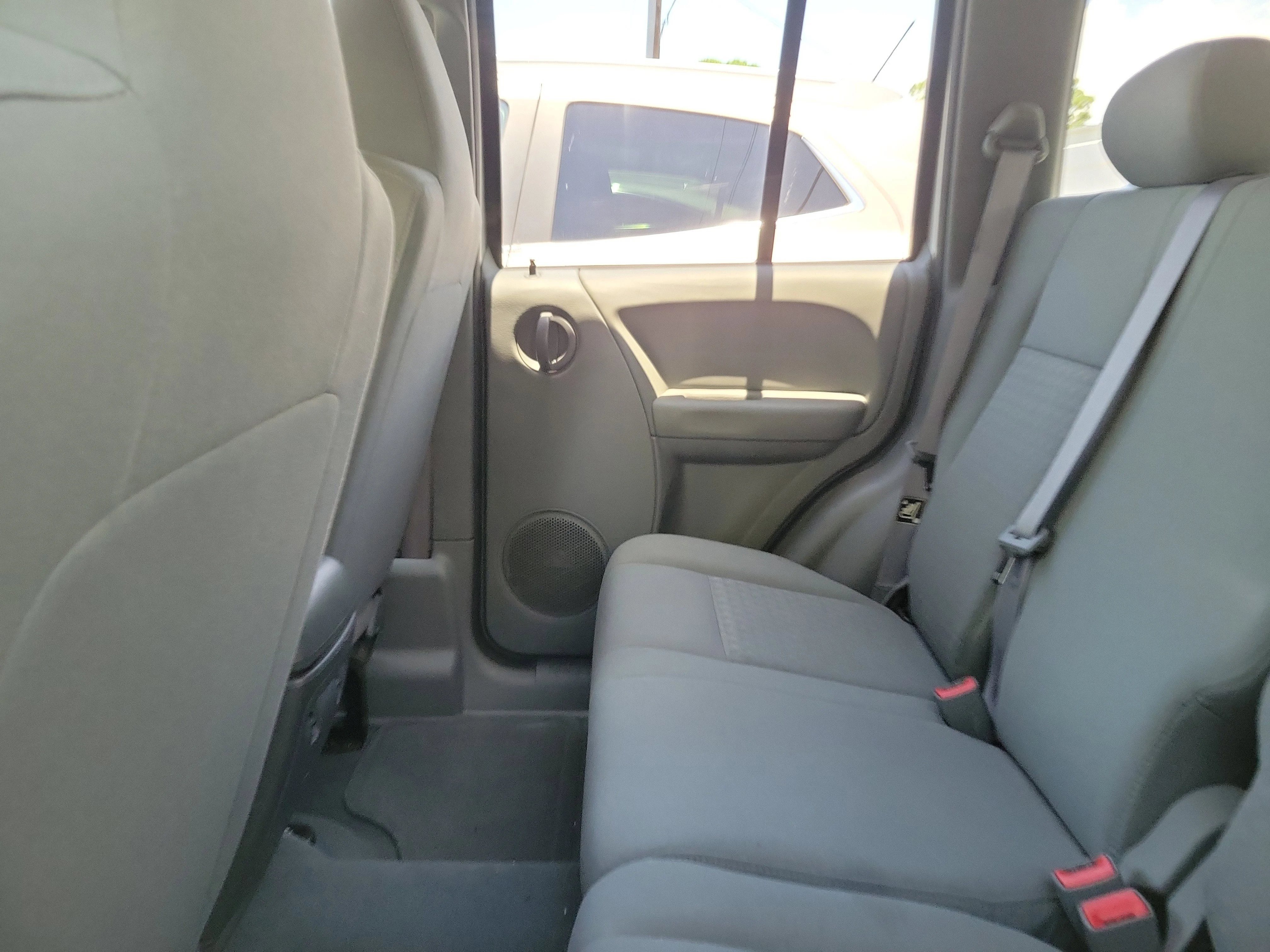 Used 2006 Bright Silver Clearcoat Metallic Jeep Sport image 8