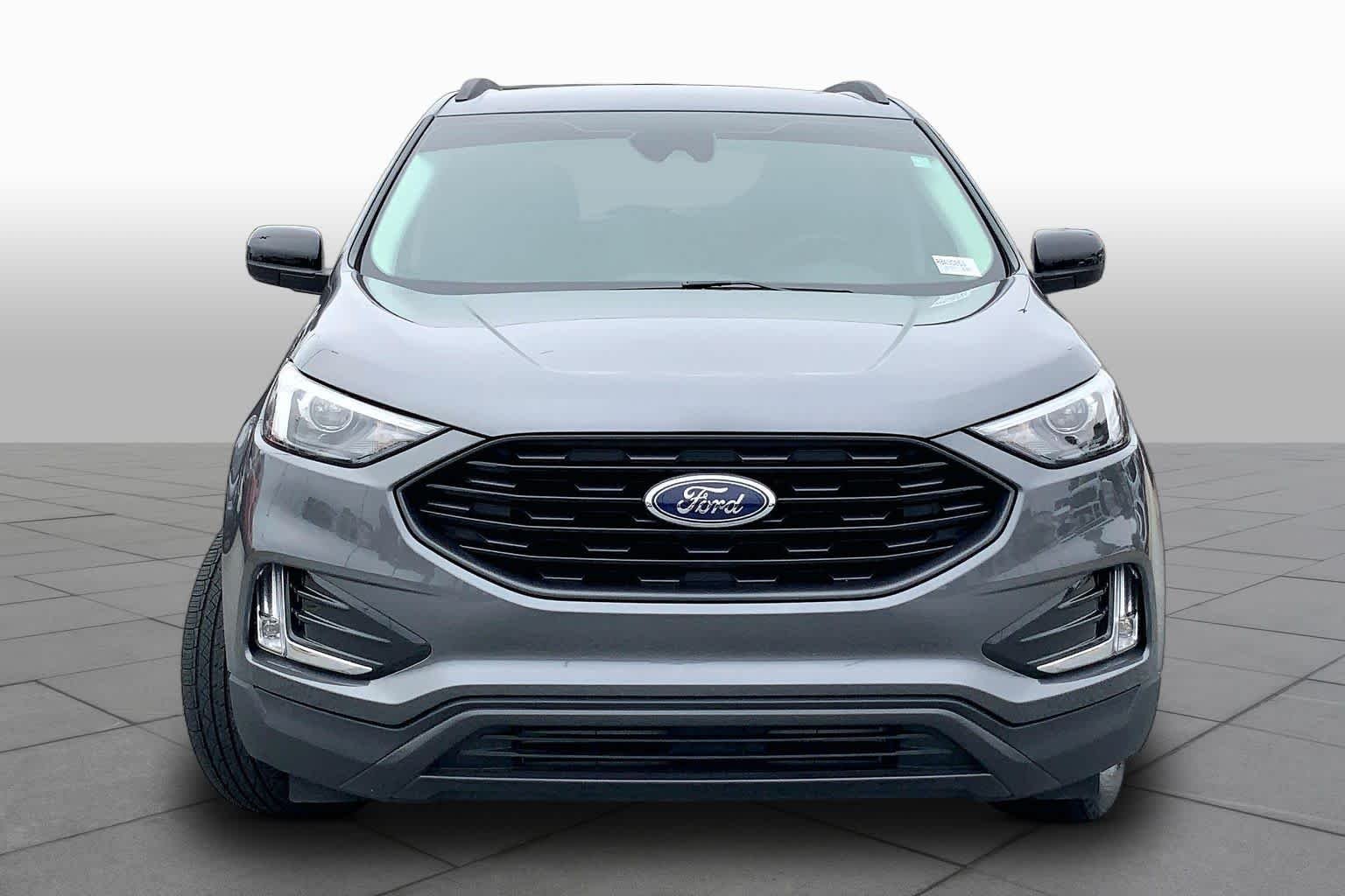 Used 2024 Carbonized Gray Metallic Ford SEL image 4