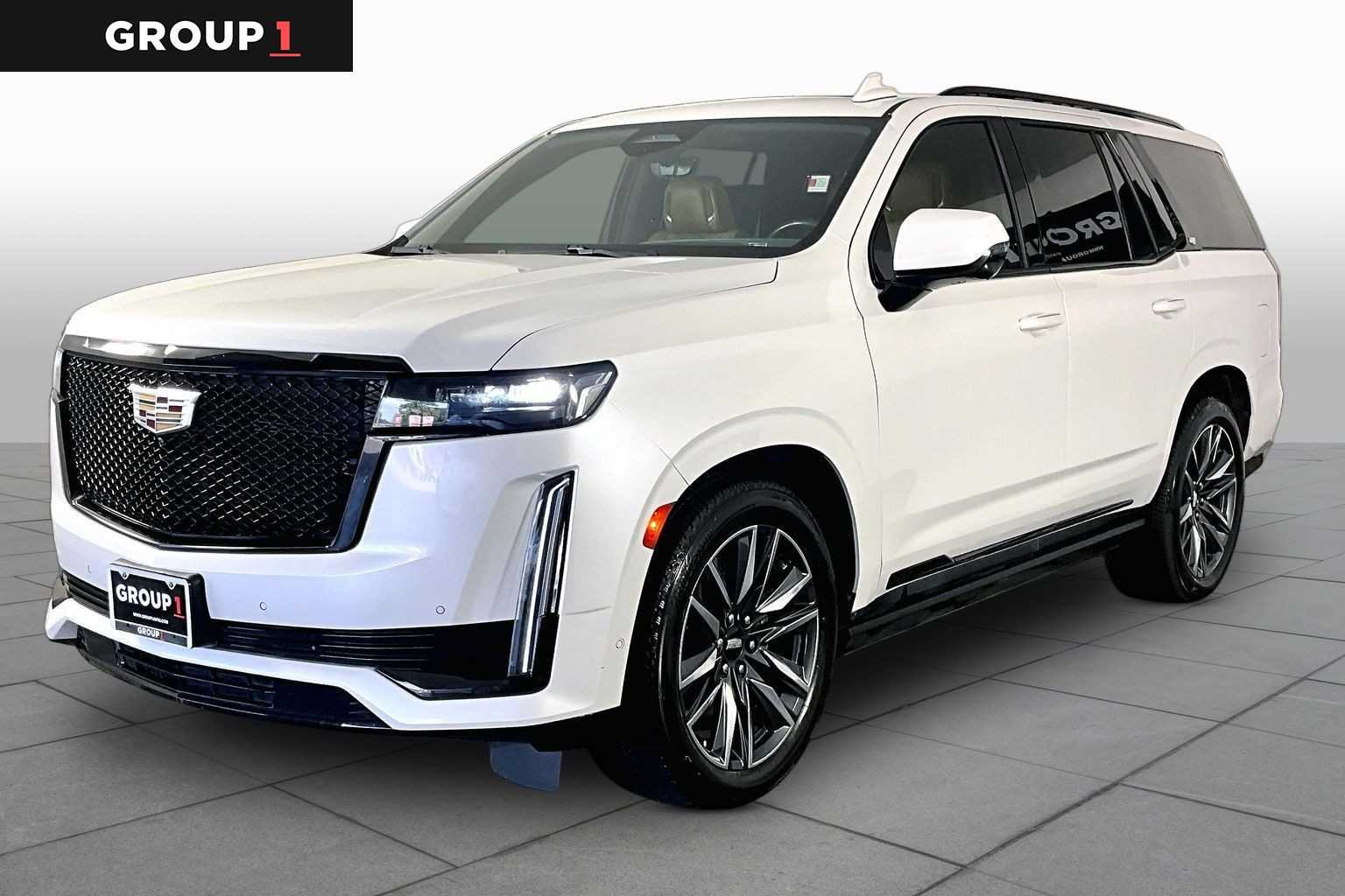 Used 2021 CRYSTAL WHITE TRICOAT Cadillac Sport image 1