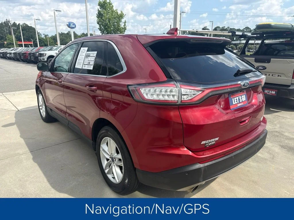 Used 2016 Ruby Red Metallic Tinted Clearcoat Ford SEL image 4