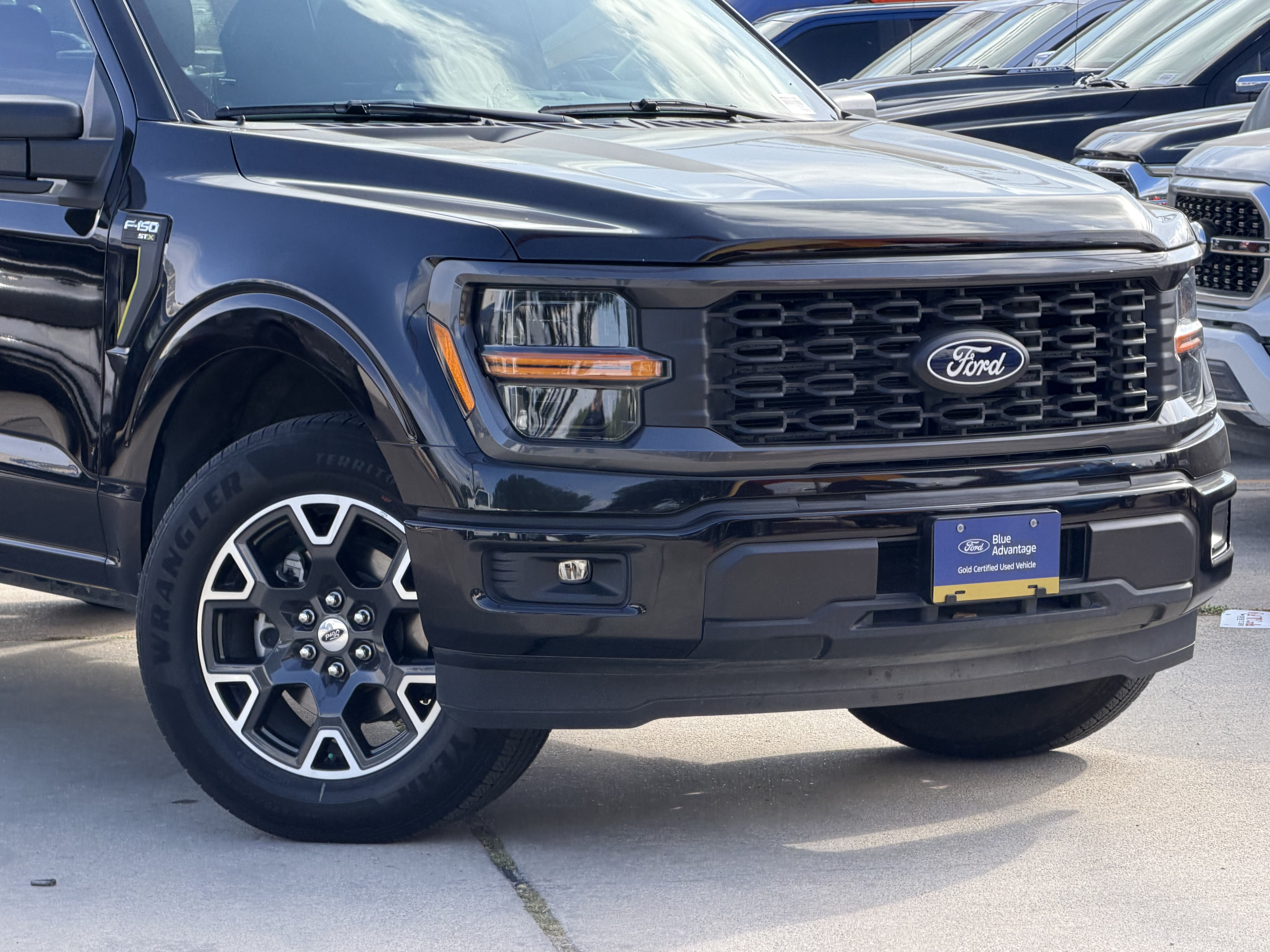 Used 2024 Agate Black Metallic Ford STX image 2