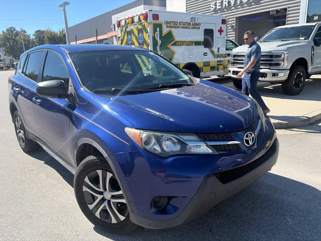 Used 2015 Blue Crush Metallic Toyota LE image 1