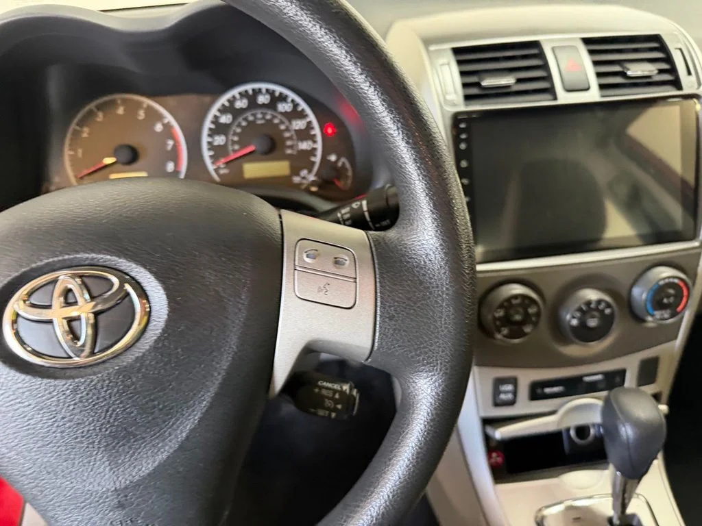 Used 2012 Barcelona Red Metallic Toyota LE image 17
