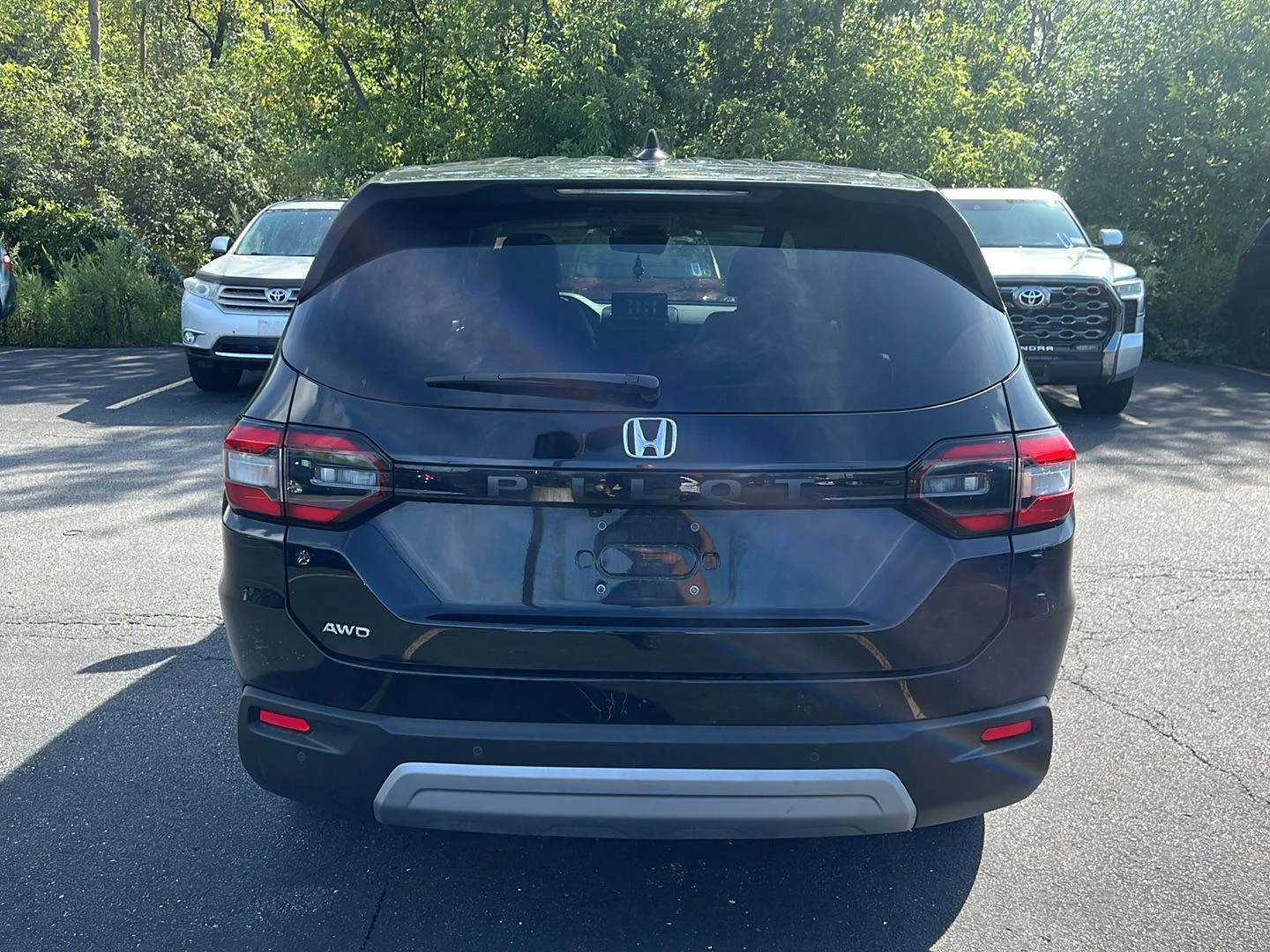 Used 2023 Crystal Black Pearl Honda EX-L w/Rear Captain