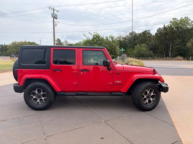 Used 2017 Red Jeep Unlimited Sahara image 6