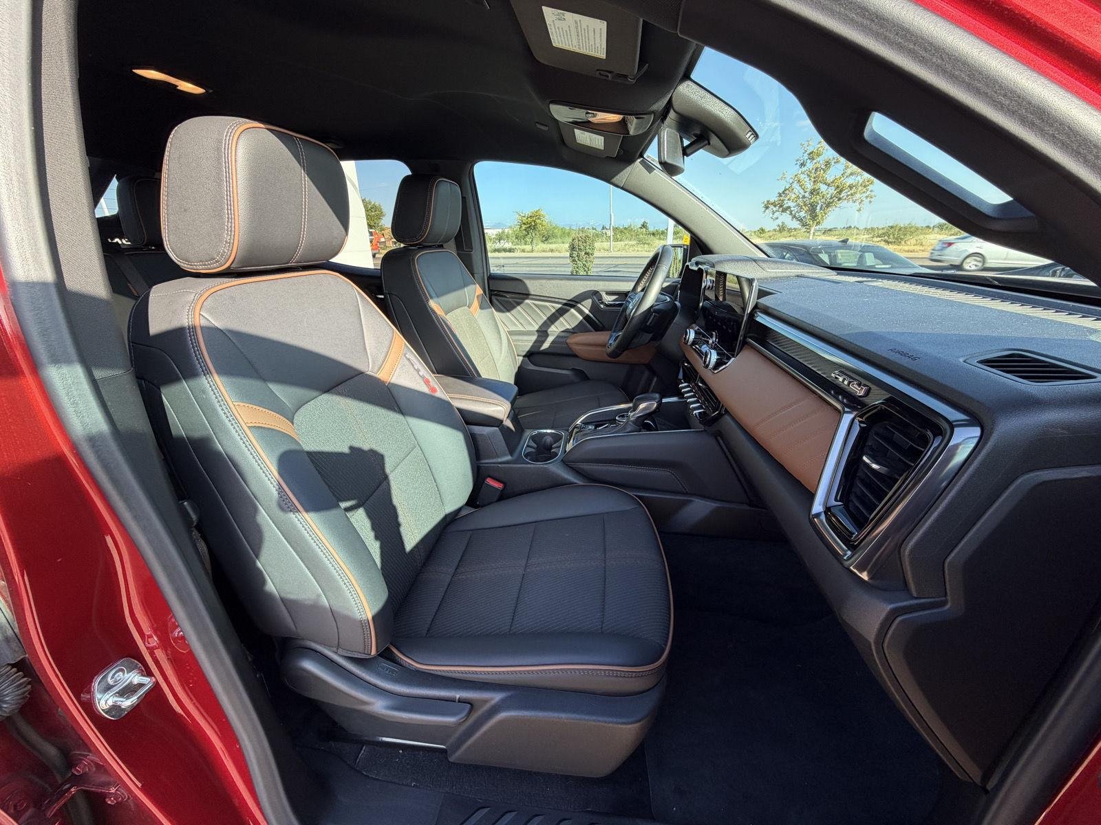 Used 2025 Volcanic Red Tintcoat GMC 4WD AT4 image 28