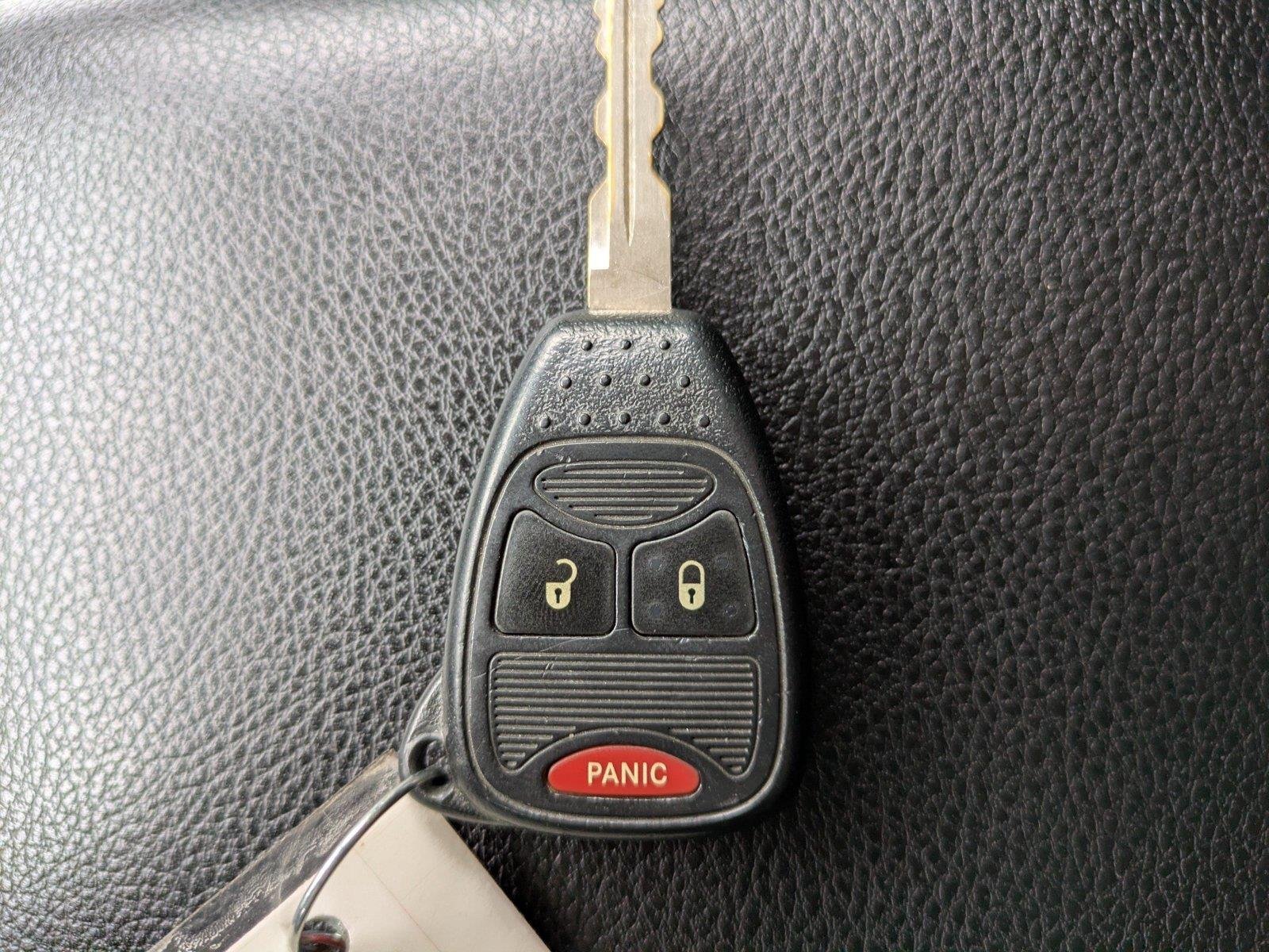 Used 2015 Hydro Blue Pearl Coat Jeep Sport image 23