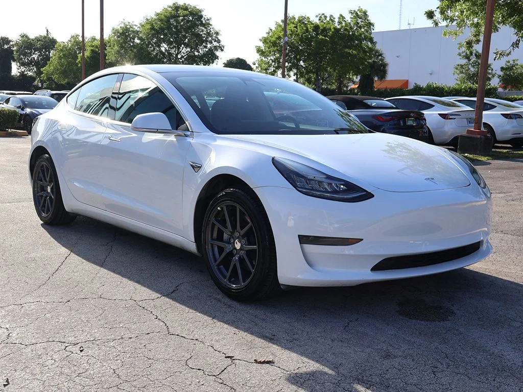 Used 2019 Tesla Model 3 Mid Range with VIN 5YJ3E1EA5KF482913 for sale in Miami, FL