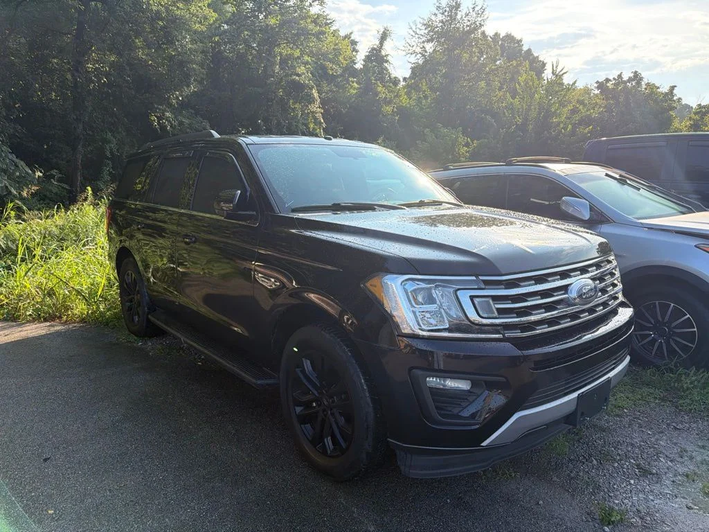 Used 2019 Agate Black Metallic Ford XLT image 1