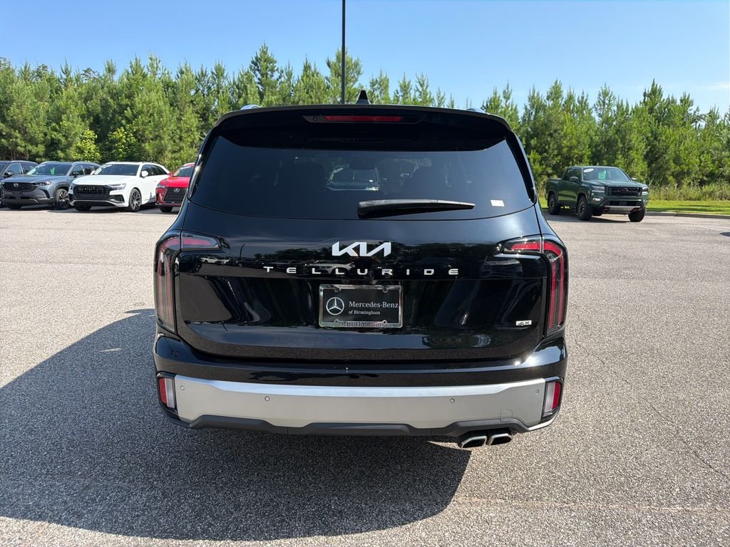 Used 2023 Ebony Black Kia SX-Prestige image 16