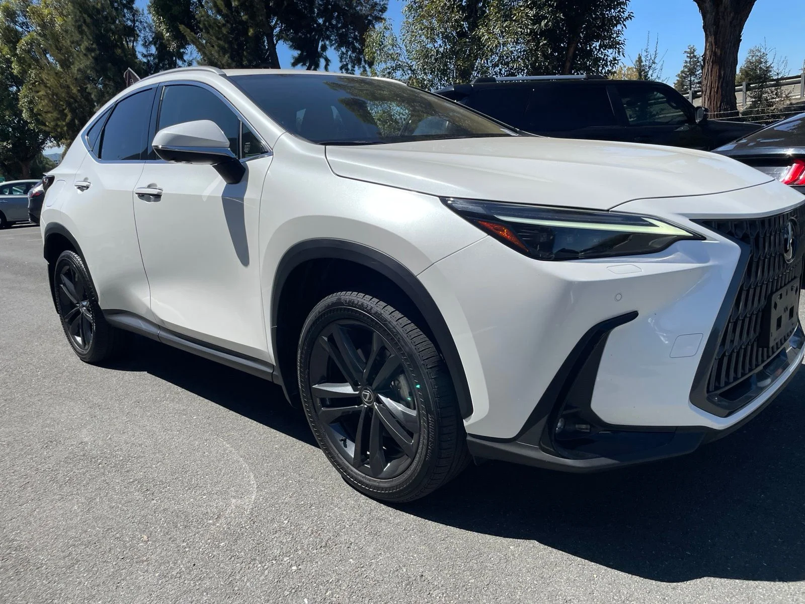 Used 2024 White Pearl Lexus 450h+ Luxury image 4