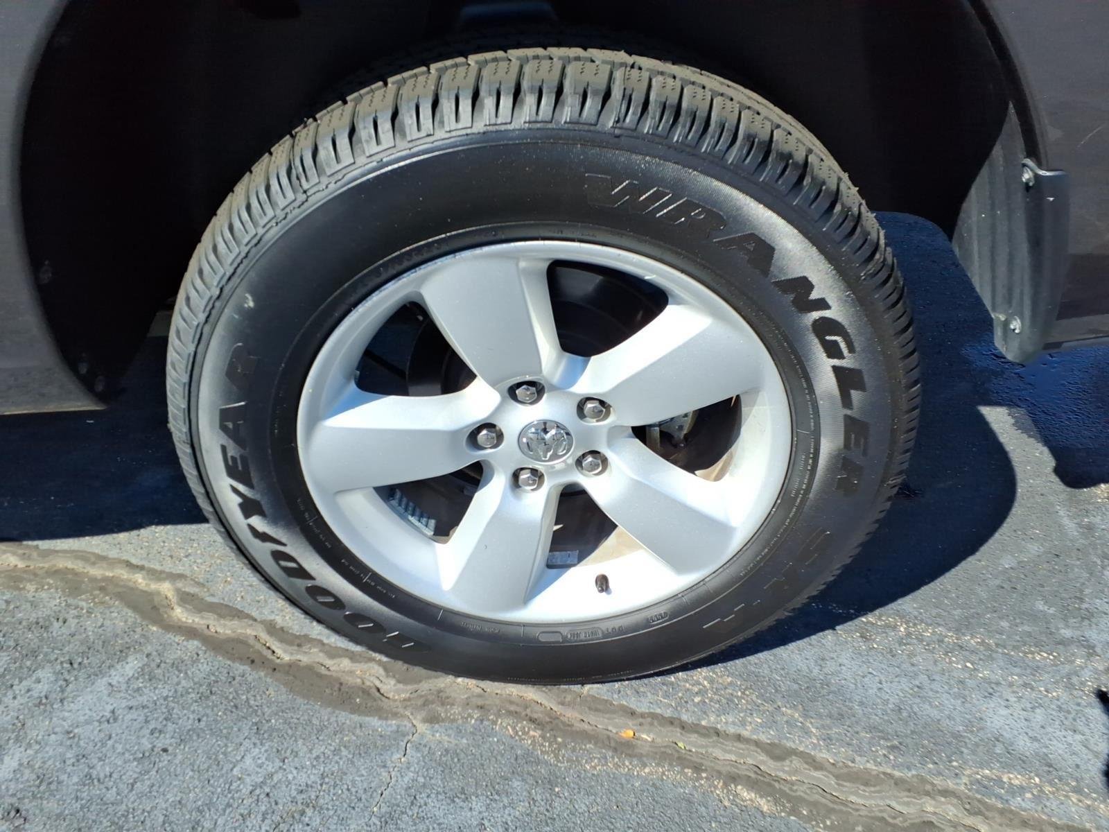 Used 2024 Granite Crystal Metallic Clearcoat Ram SLT image 11