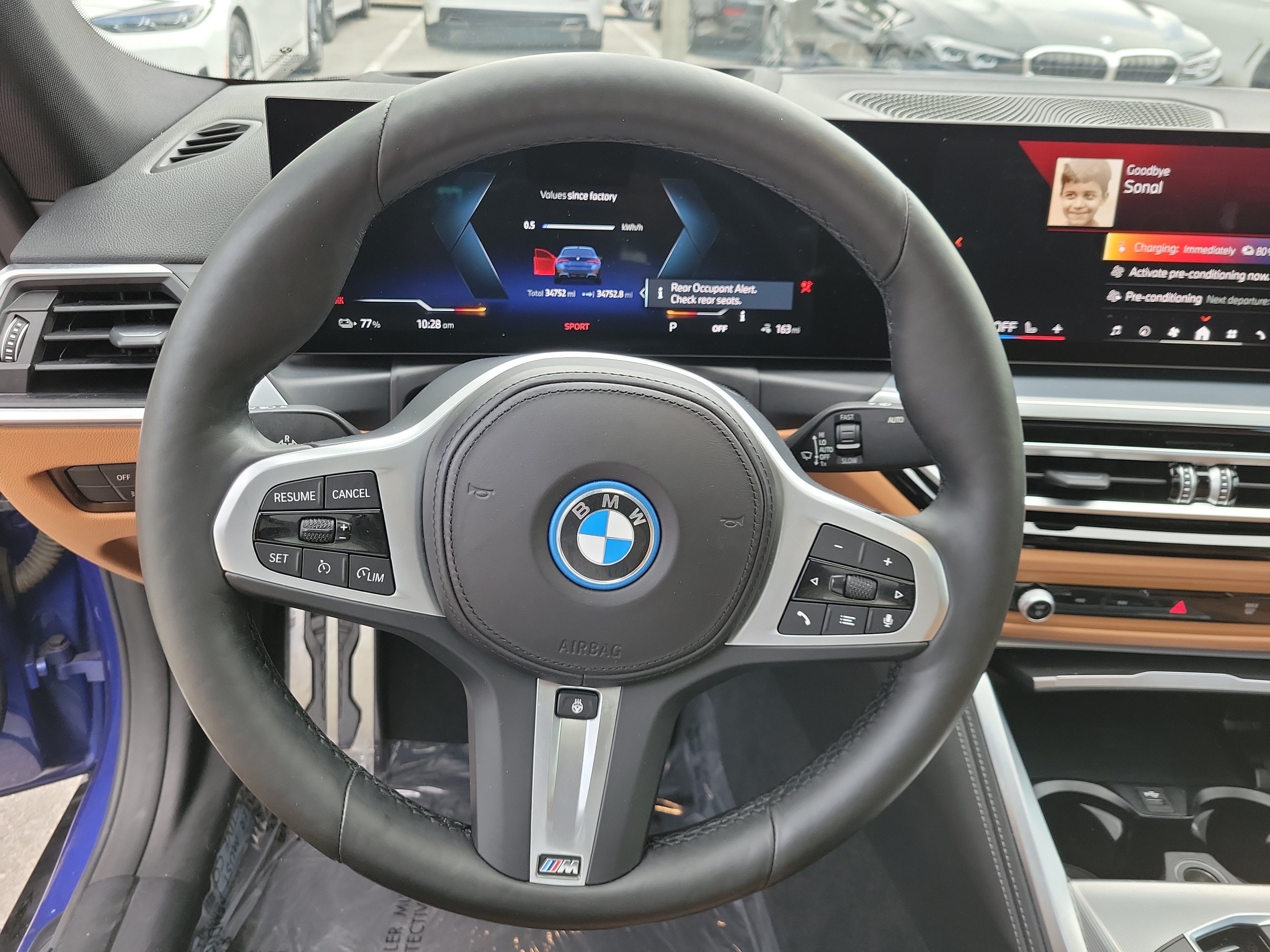 Certified Used 2024 Portimao Blue Metallic BMW eDrive40 image 17