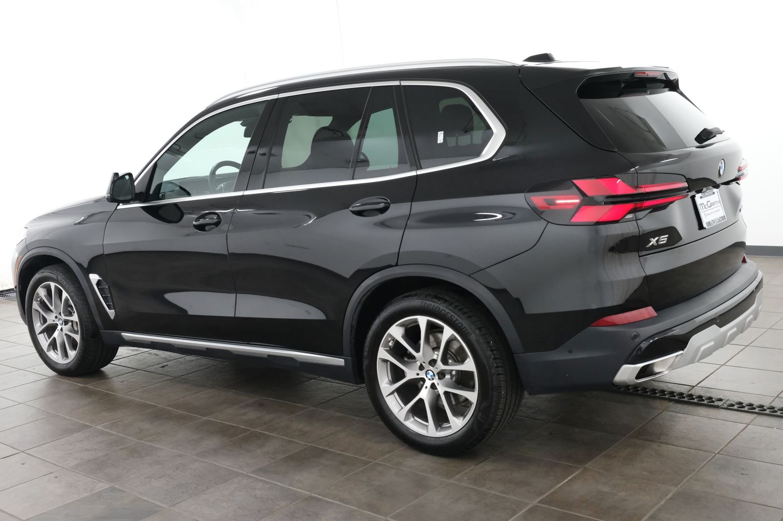 Certified Used 2024 Black Sapphire Metallic BMW xDrive40i image 3