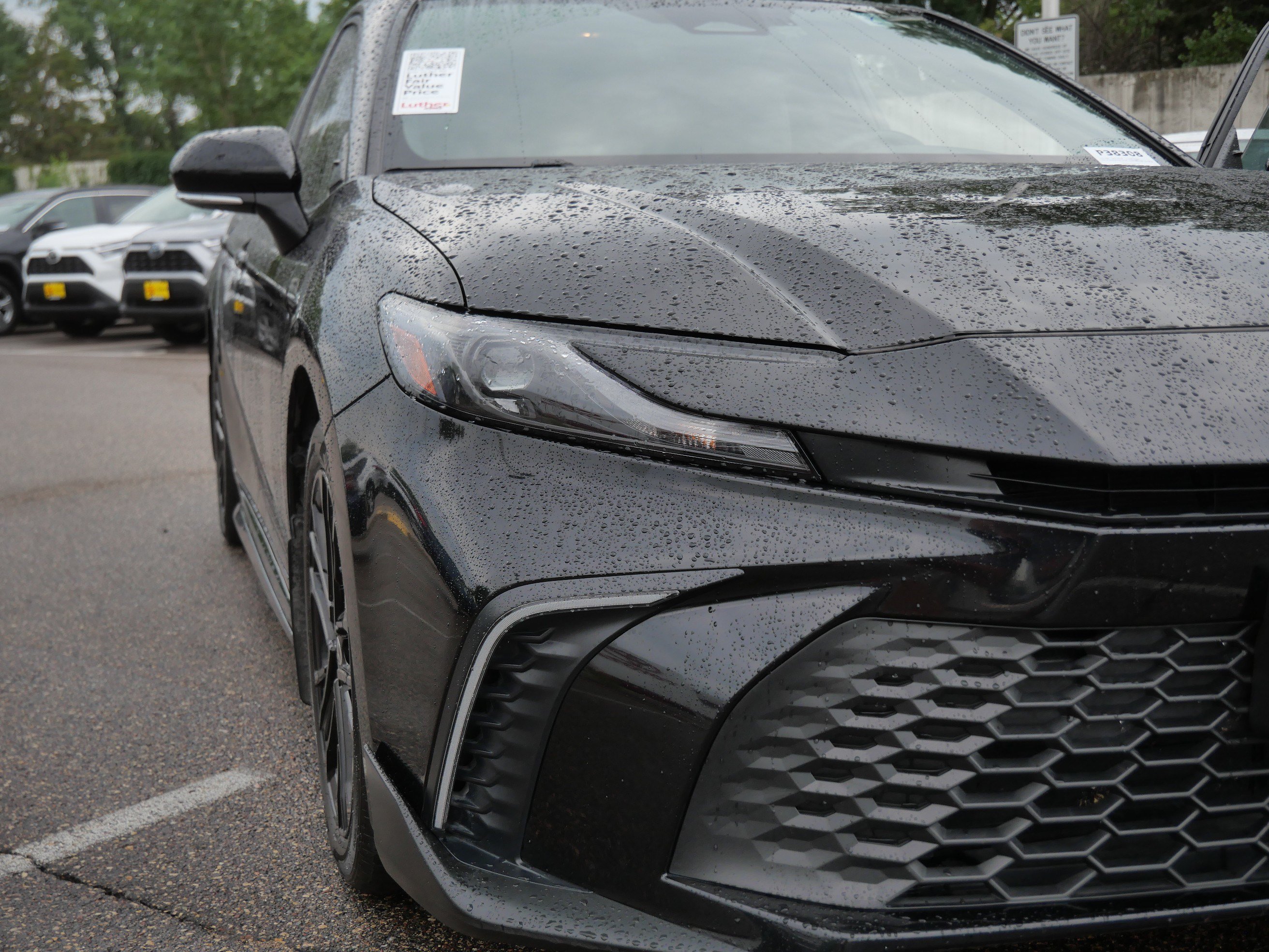Used 2025 Midnight Black Metallic Toyota SE image 17