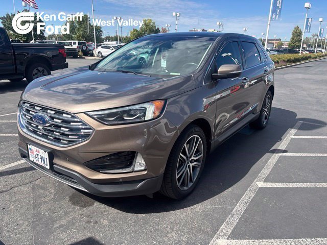 Used 2019 Stone Gray Metallic Ford Titanium image 1