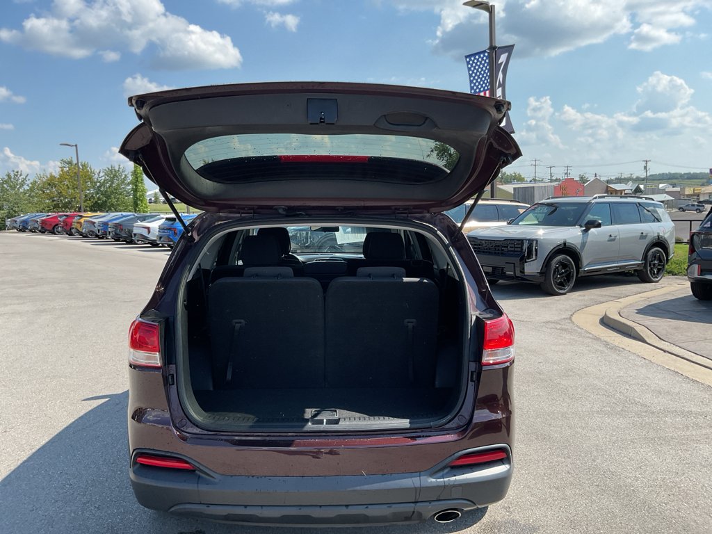 Used 2016 Dark Cherry Kia LX image 13